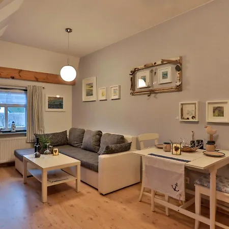 Reetdachhaus Am Haff Casa de Férias *
